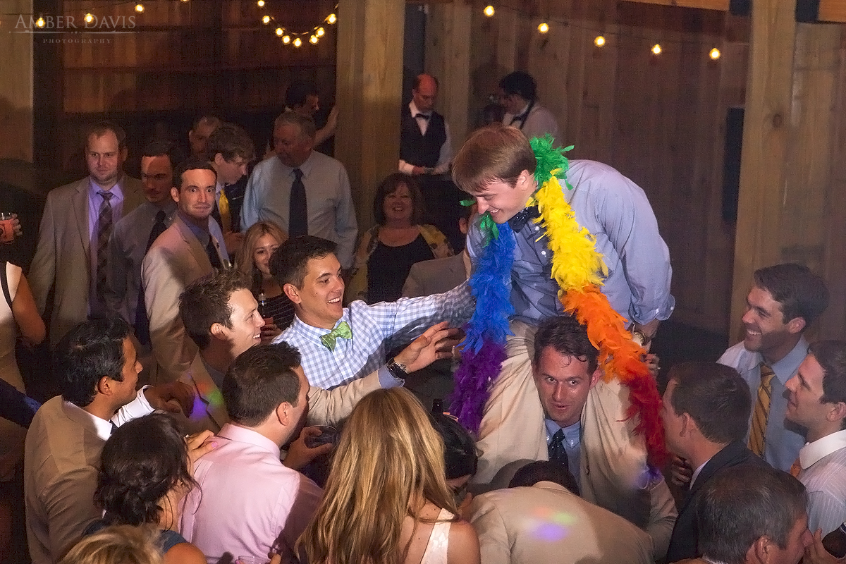 groom gets lifted up reception